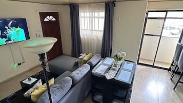 Deluxe Apartment, 2 Bedrooms, Kitchen | Living area