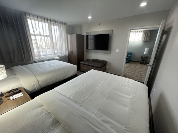 Suite, 2 Double Beds, Non Smoking | Desk, laptop workspace, free WiFi, bed sheets