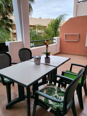 Outdoor dining - Exotic front line apartment with communal swimming pool (Vera)
