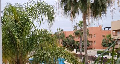 Exotic front line apartment with communal swimming pool