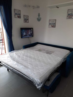 2 habitaciones, tabla de planchar con plancha y ropa de cama 