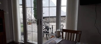 "The Annex" a secret escape on a historic site with stunning views.