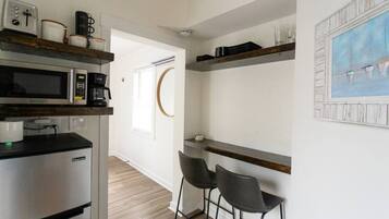 Fridge, microwave, coffee/tea maker, toaster