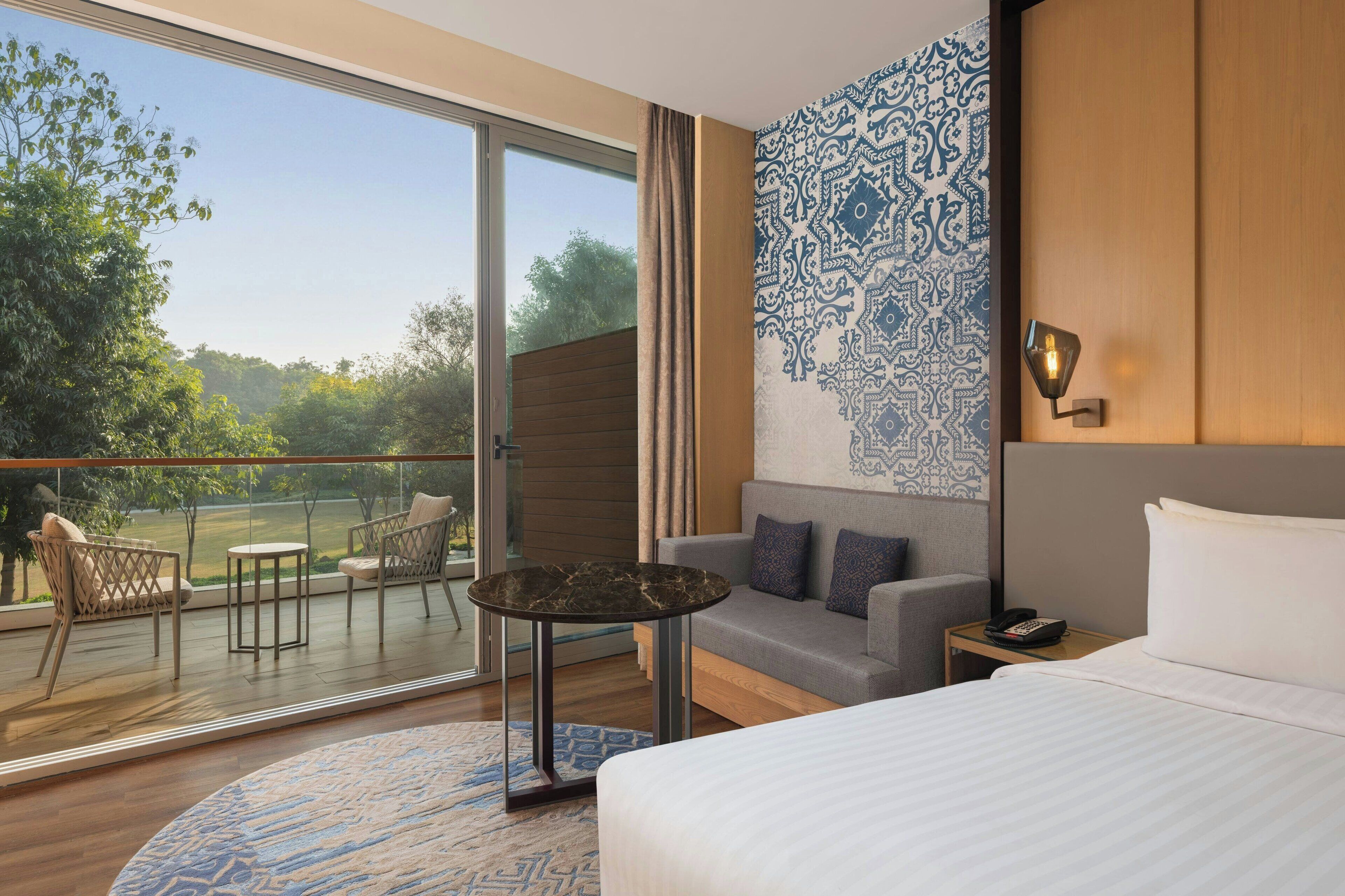 Premier Room, 1 King Bed | Minibar, in-room safe, individually decorated, individually furnished