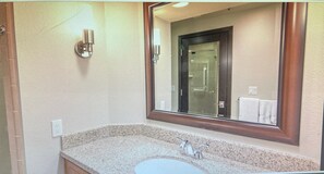 Combined shower/bathtub, hair dryer, towels, soap