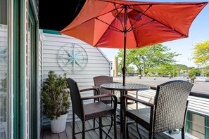 Outdoor dining - Compass Pointe Condominium - Steps to downtown, close to Lake Michigan (Grand Haven)