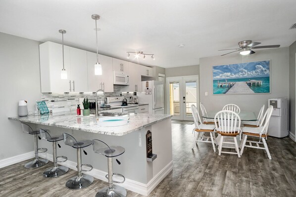 Fridge, microwave, oven, stovetop - Coastal Getaway - Steps from the Beach! (Cape Canaveral)