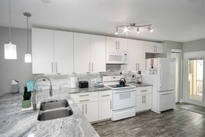 Fridge, microwave, oven, stovetop - Coastal Getaway - Steps from the Beach! (Cape Canaveral)