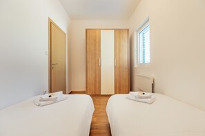4 bedrooms, iron/ironing board, travel cot, WiFi