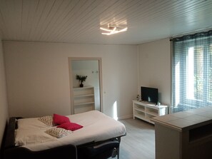 Premium bedding, memory-foam beds, desk, laptop workspace