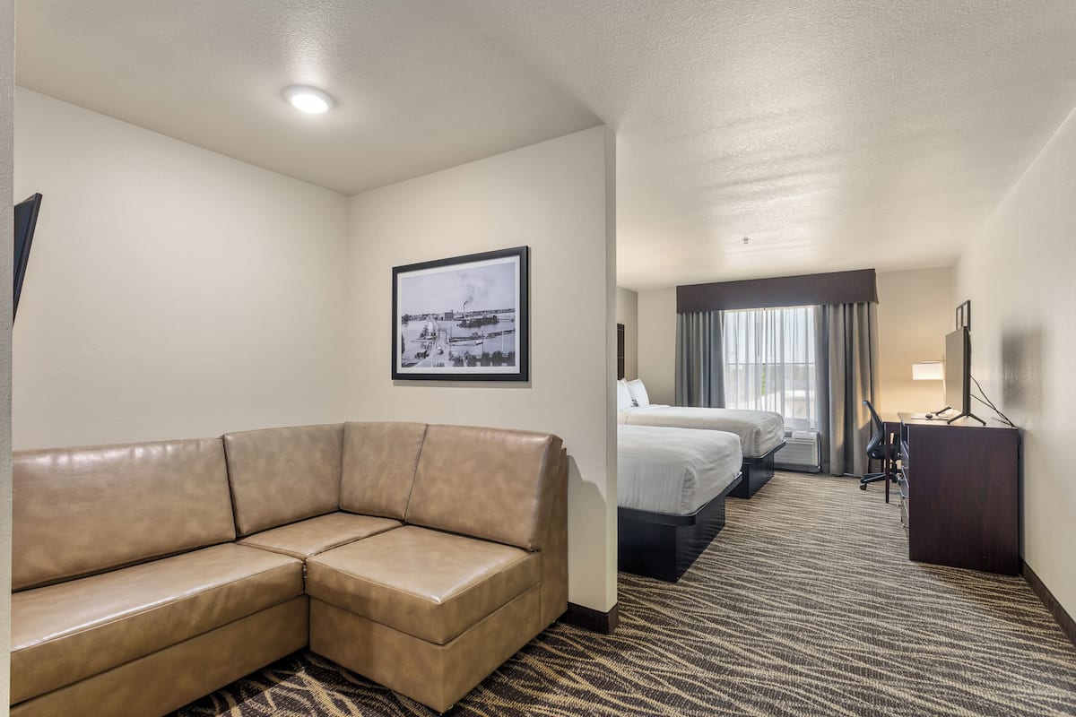 Premium bedding, pillowtop beds, desk, laptop workspace
