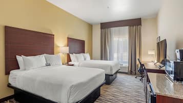 Ropa de cama de alta calidad, camas con pillow-top y escritorio