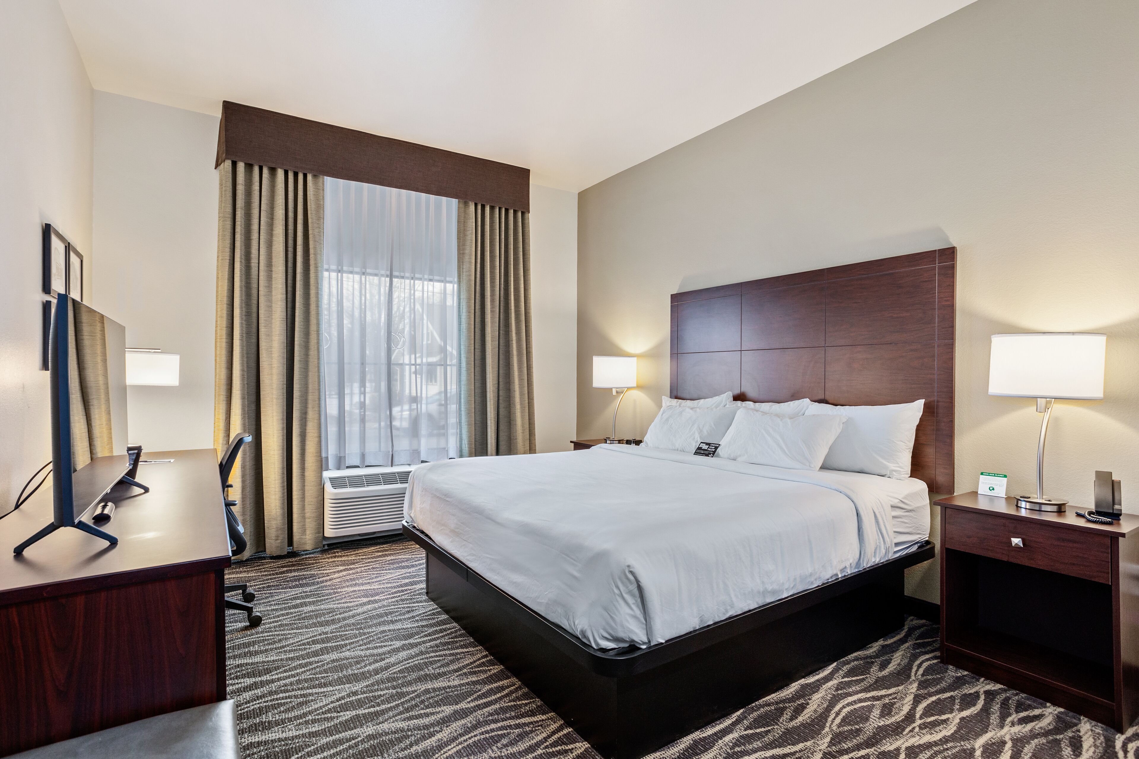 Premium bedding, pillowtop beds, desk, laptop workspace
