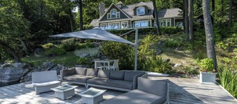 Exquisite 5 Bdrm 4 Bath Cottage with Boathouse and Professional Gym! SW Views!