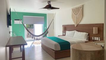 Deluxe Room, 1 King Bed | In-room safe, individually decorated, individually furnished, desk