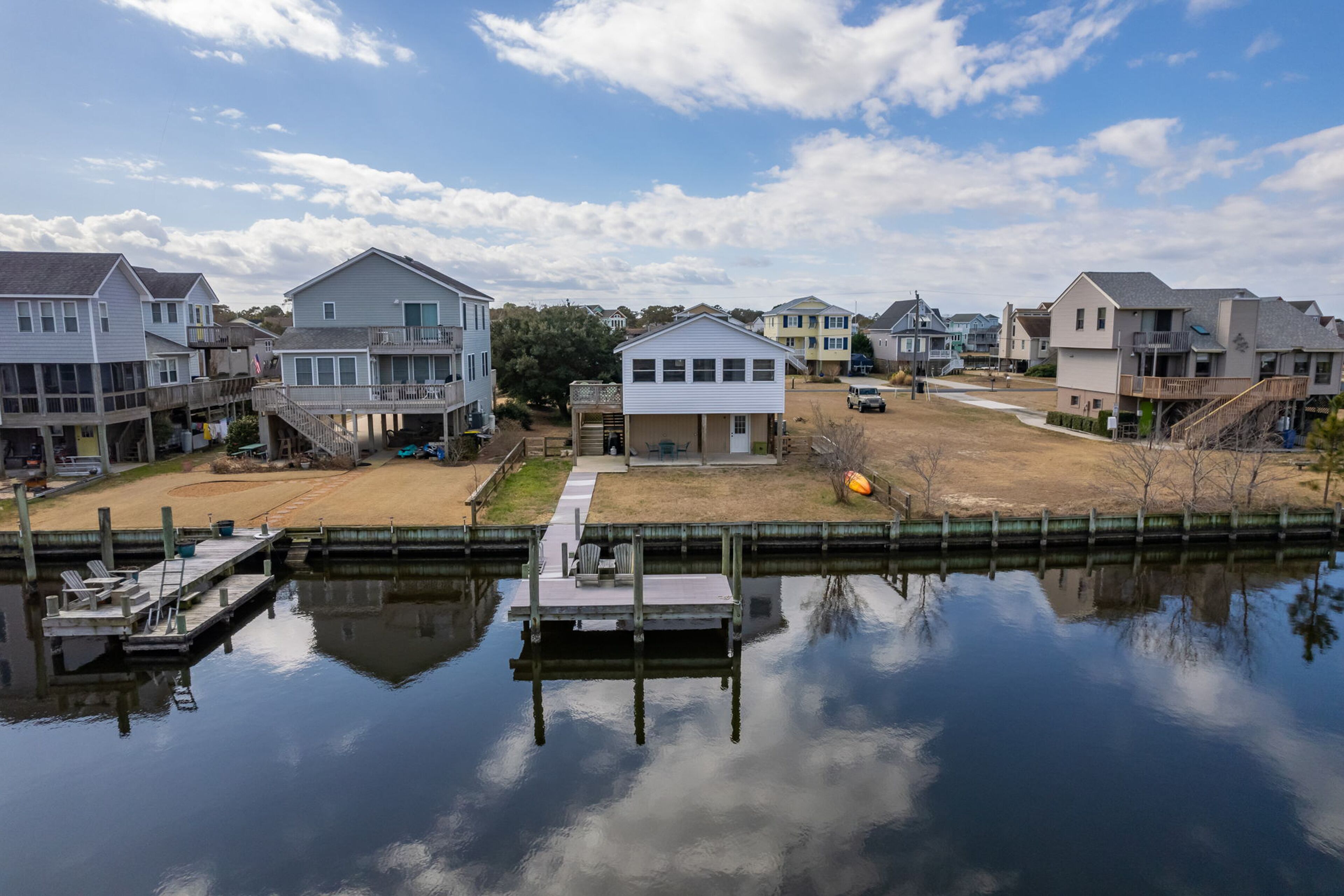Waterfront dog-friendly wonder with private boat dock, pool & tennis courts