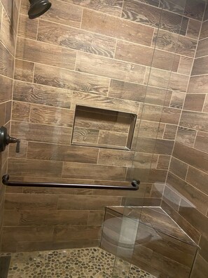 Bathtub, hair dryer, towels, soap