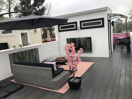 Newly constructed modern home with luxurious rooftop patio