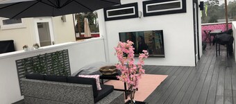 Newly constructed modern home with luxurious rooftop patio