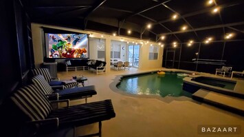 100” projector screen, Professional BBQ, Screened in pool and spa area. 