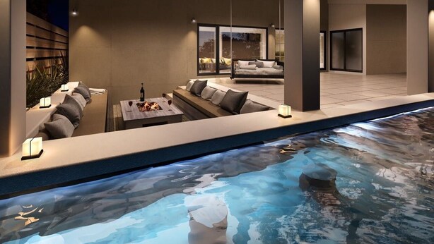 A modern indoor pool area with a seating area, a fire feature, and a view of the outdoors. - MARINX POOLVILLA NAKANDAKARI (Nanjo)