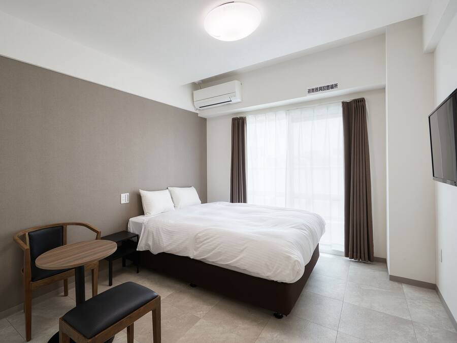 Doppia Comfort | Una scrivania, tende oscuranti, Wi-Fi gratuito