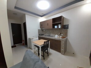 Fridge, stovetop, cookware/dishes/utensils