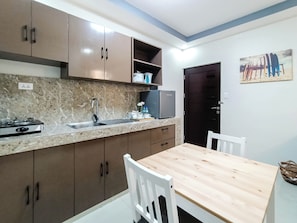 Fridge, stovetop, cookware/dishes/utensils