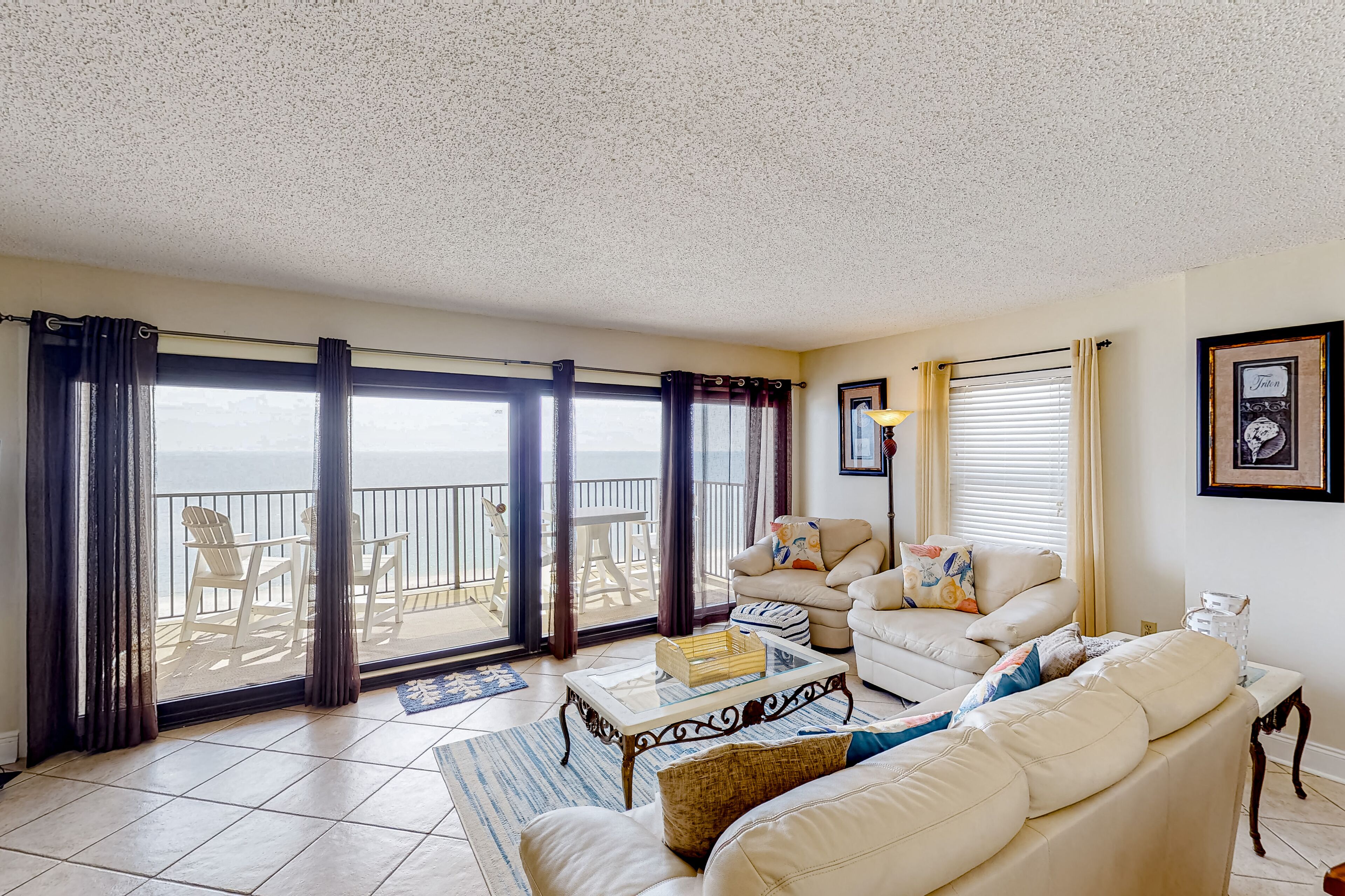 5th floor gulf-front condo with WiFi, central ac, balcony, pool, & beach access