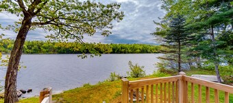 Lakefront cabin with private dock, wood stove, firepit, deck, & grill - 1 dog ok