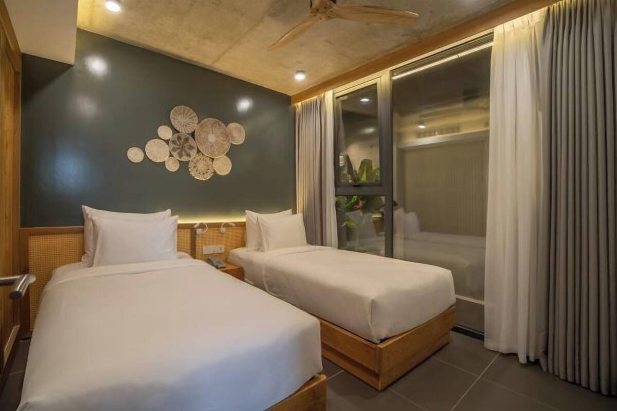 Luxe beddengoed, pillowtop-bedden, een minibar, een kluis op de kamer