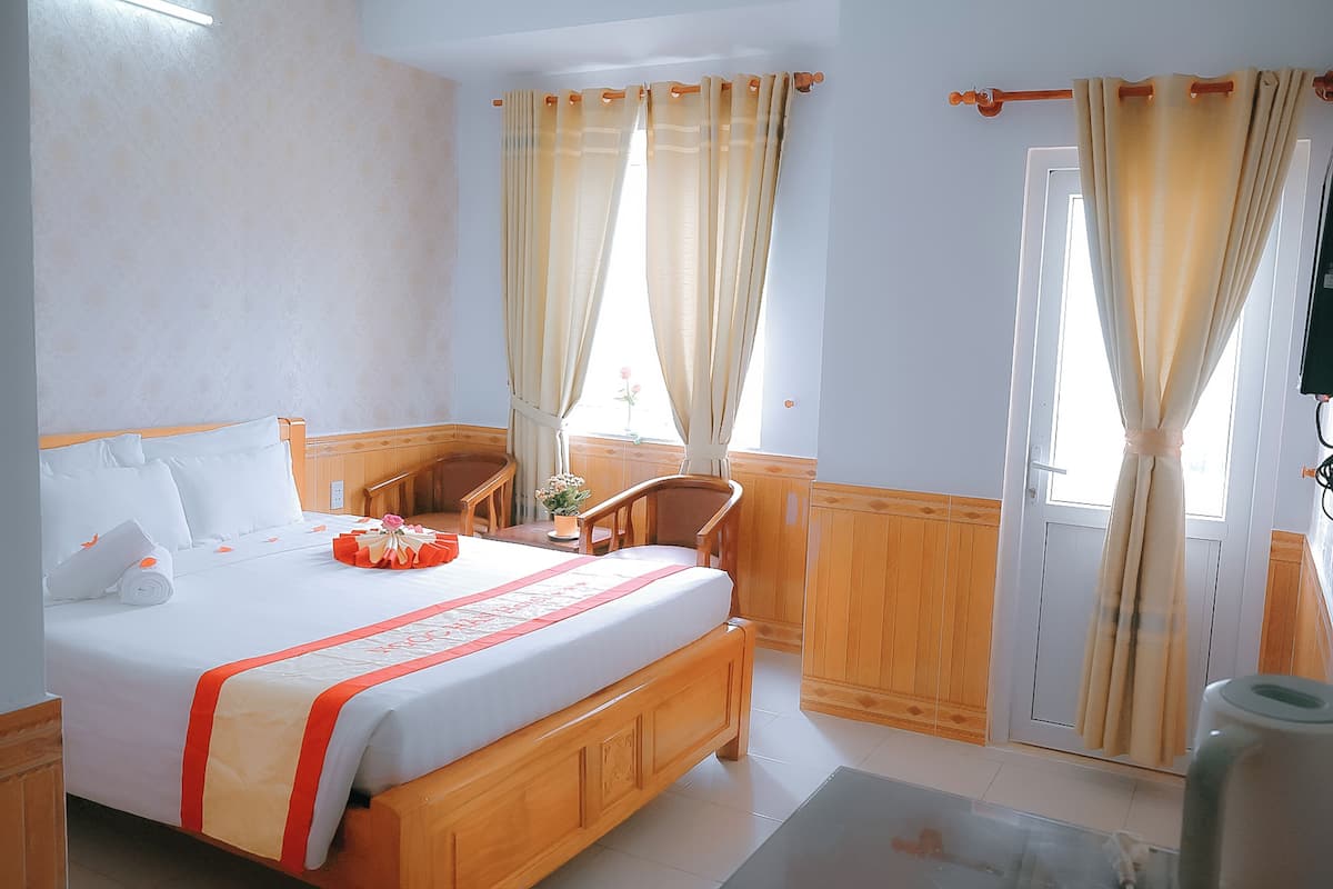 Habitación doble superior, 1 cama Queen size, vista al mar | Ropa de cama de alta calidad, camas con efecto memoria y escritorio