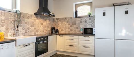 Réfrigérateur, four, plaque de cuisson, lave-vaisselle