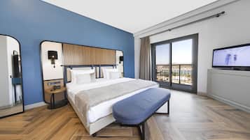Suite Confort | Minibar, caja de seguridad en la habitación, wifi gratis y ropa de cama