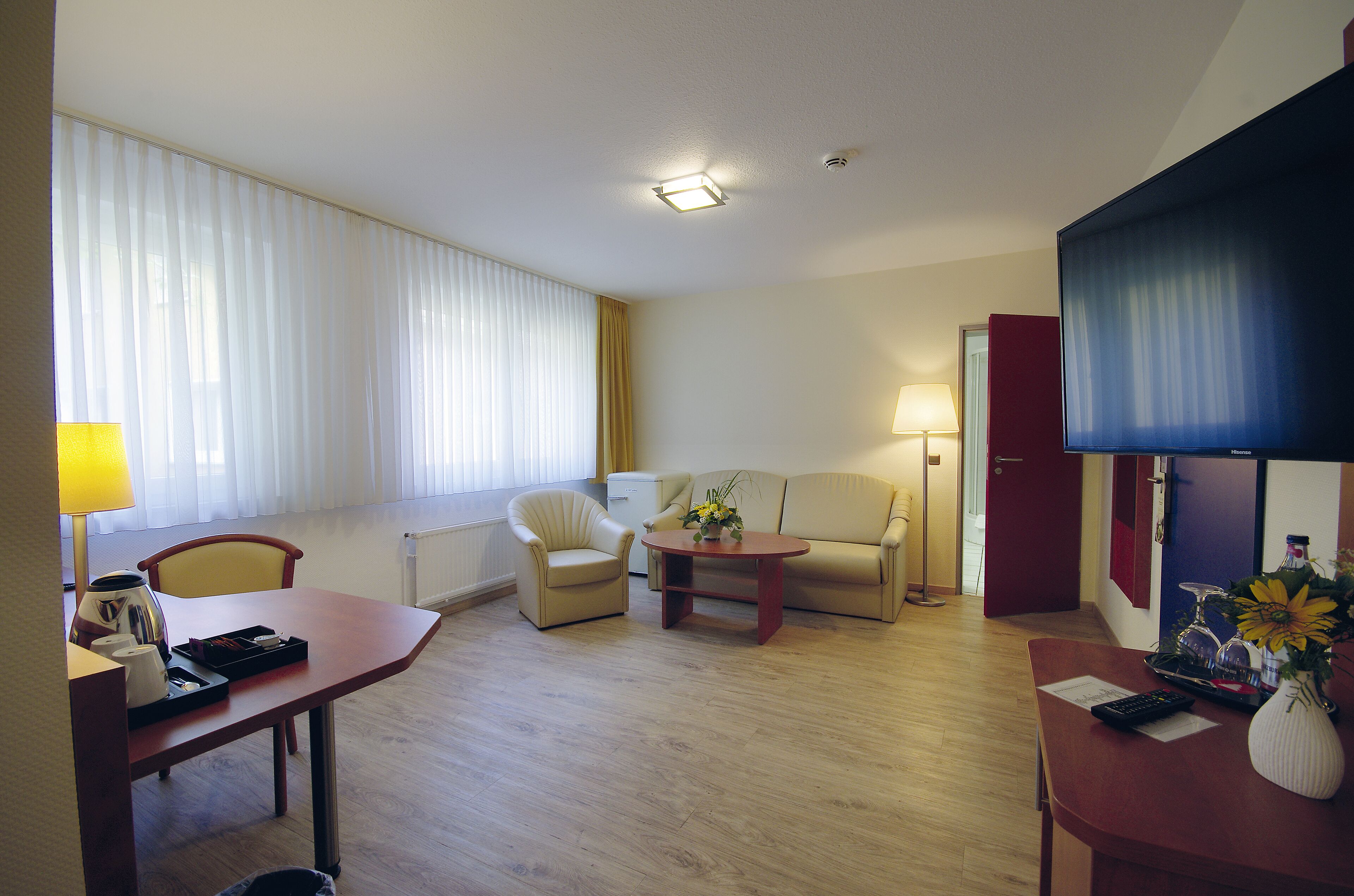 superior double room | living area | 50-inch flat-screen tv with satellite channels, tv