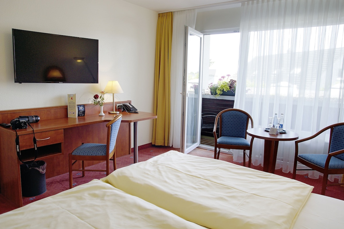 Hypo-allergenic bedding available, desk, laptop workspace