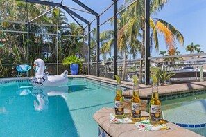 A heated pool, sun loungers