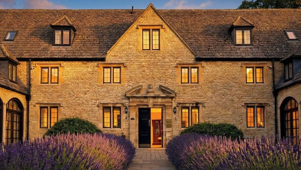 A stone building with a central entrance, multiple windows, and a symmetrical design. - Weston Manor Hotel (Bicester)