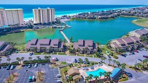 A resort with a marina, a large pool, and a view of the ocean. - Ariel Dunes II 1808  *Gulf views*Pools*Beach access (Destin)