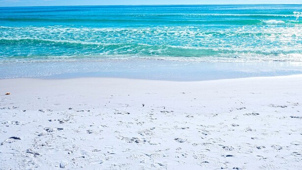 A beach with white sand and turquoise water. - Ariel Dunes II 1808  *Gulf views*Pools*Beach access (Destin)
