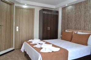 Classic Triple Room, Non Smoking, City View | Minibar, desk, laptop workspace, free WiFi - Global 2022 Hotel (Istanbul)