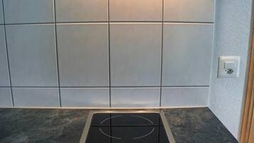 Fridge, microwave, toaster, dining tables