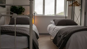 3 bedrooms, desk, iron/ironing board, travel cot