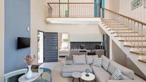 A modern apartment with a living room, kitchen, and a balcony. - Stefania - Two Bedroom Villa, Sleeps 4 (Acharavi)