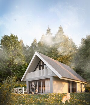 A modern house with a sloped roof, large windows, and a balcony. - Bunter Bock  Die Harz-Urlaubs-Alm (Clausthal-Zellerfeld)