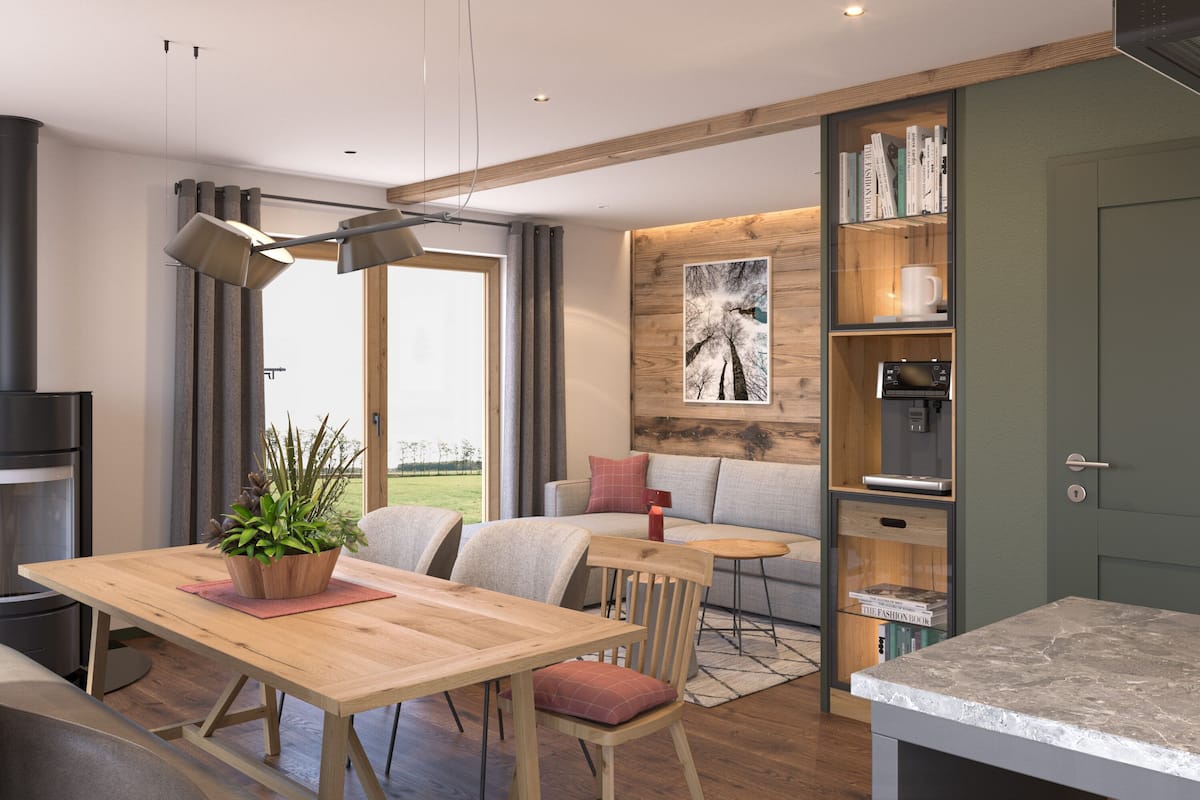 A modern kitchen with a wooden dining table, chairs, and a built-in coffee machine.