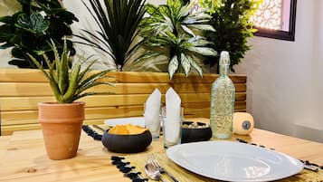 Chambre Double Deluxe, cheminée, vue mer | Restaurant