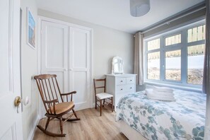 3 bedrooms, desk, iron/ironing board, travel cot