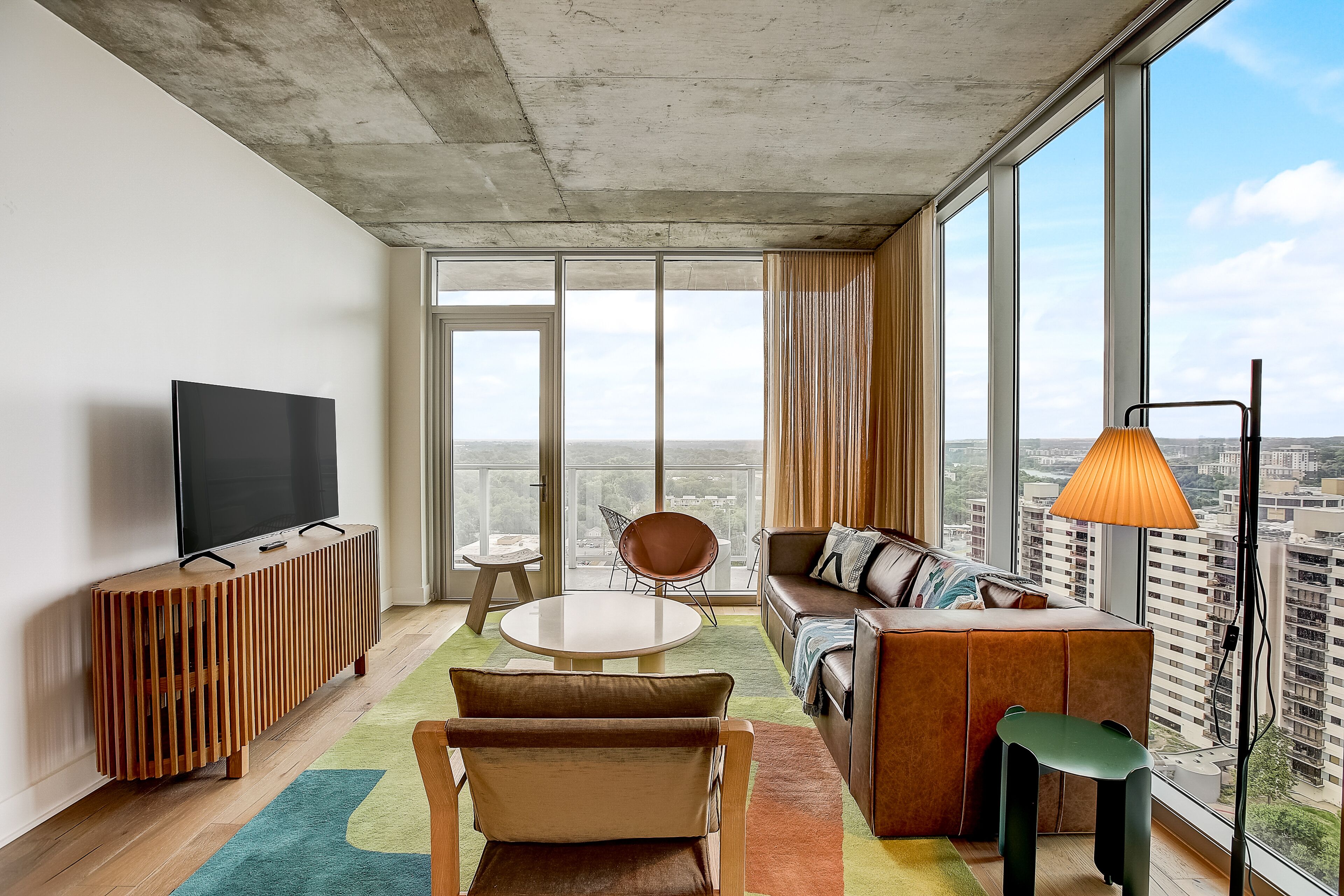 Brand new condo on Rainey Street with sunrise-view balcony, rooftop pool & gym