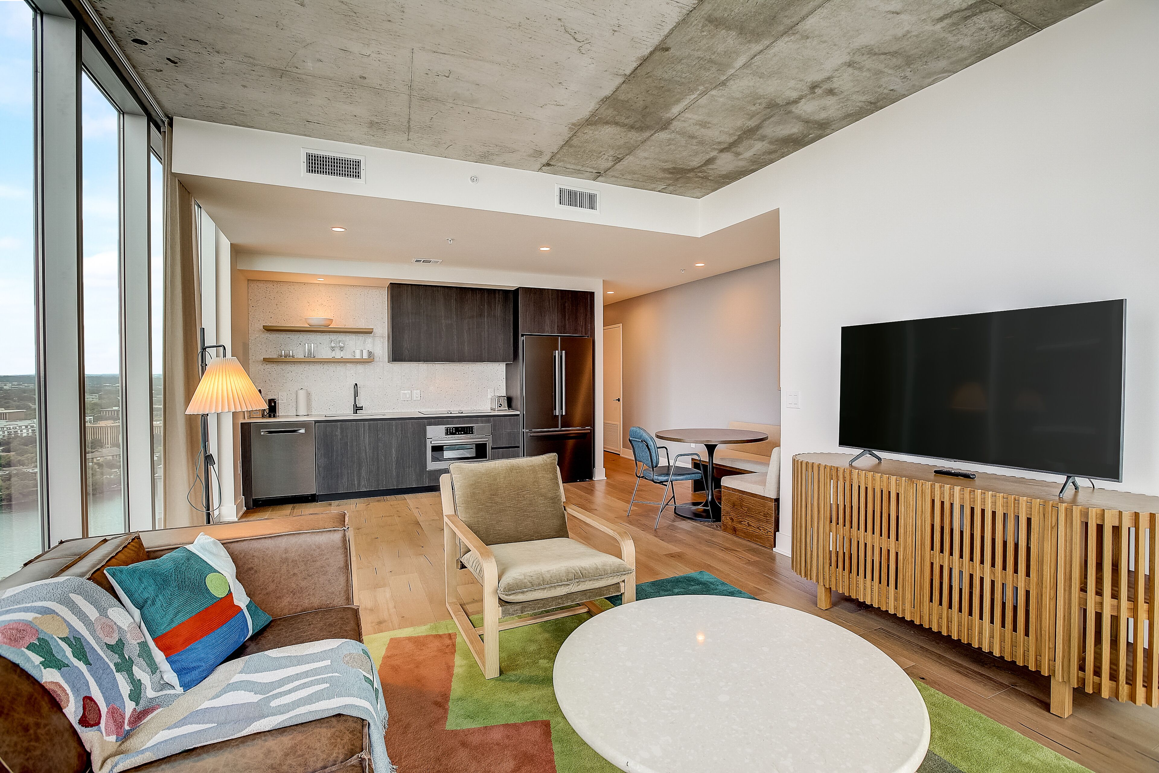 Brand new condo on Rainey Street with sunrise-view balcony, rooftop pool & gym